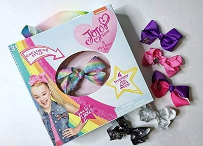 Jojo siwa mini moños sorpresa. Caja con 5 moños. Uno a la vista, 4 sorpresas. 20 modelos sorpresa