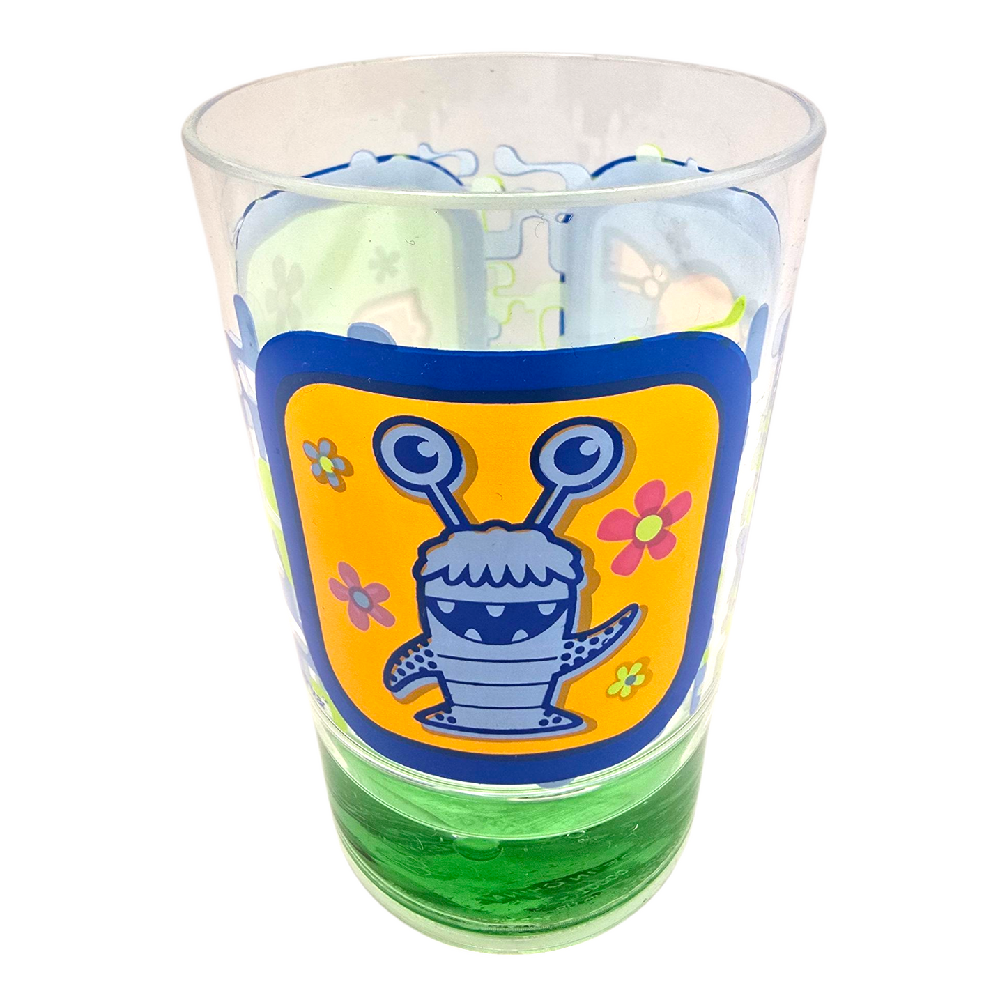 Vasito pequeñito vintage Monsters Inc con agua En la base